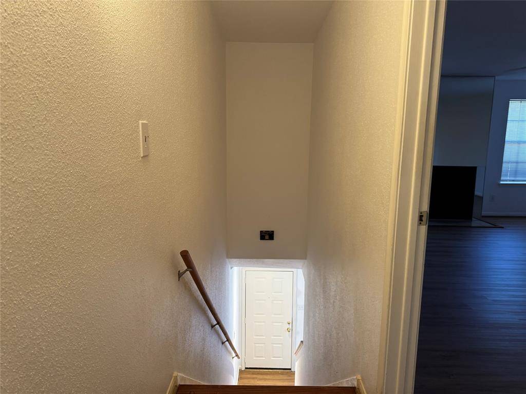 View of the staircase leading down to the first floor.