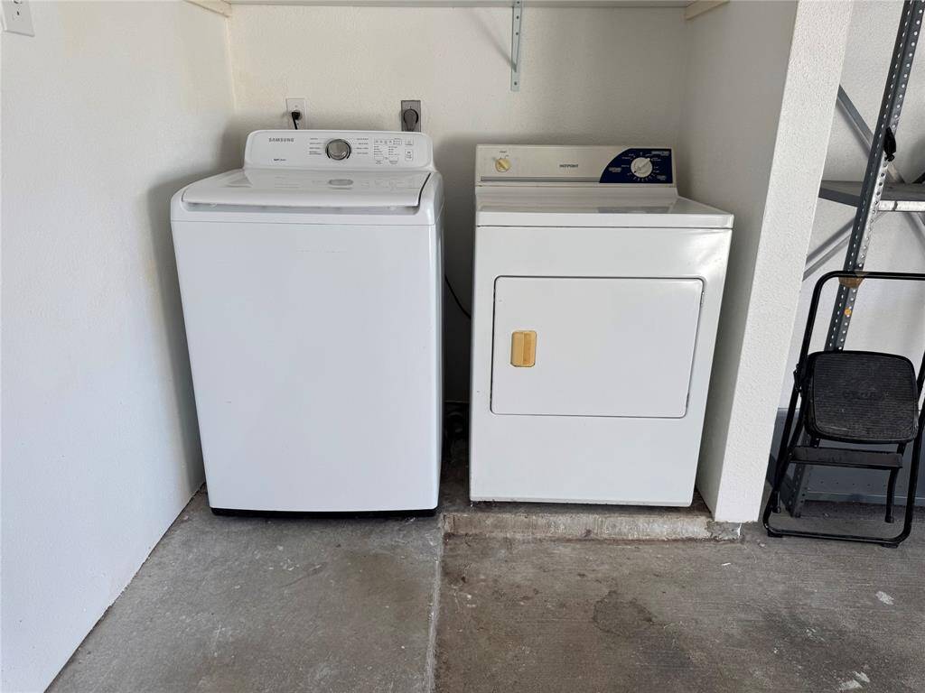 The utility space is located in a garage.