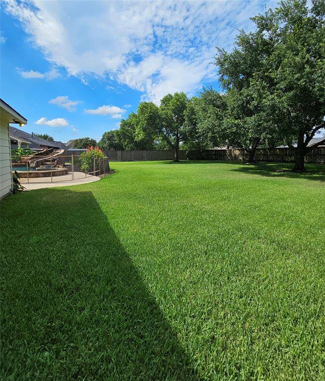 Green space behind the 6 car garage.