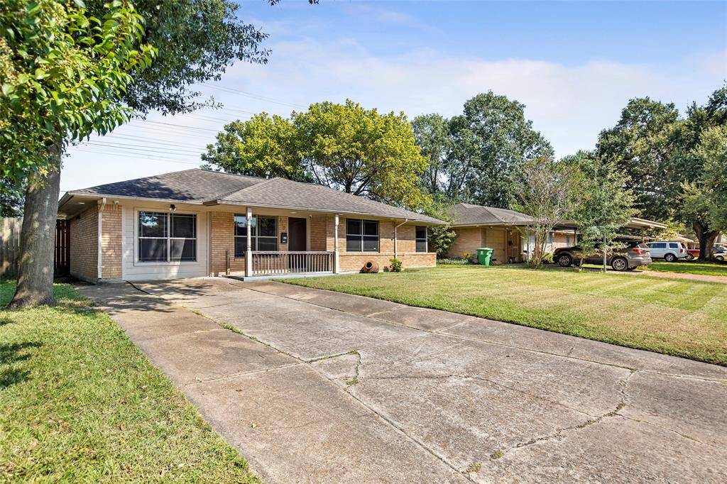 The double wide driveway has ample room for up to four vehicles.