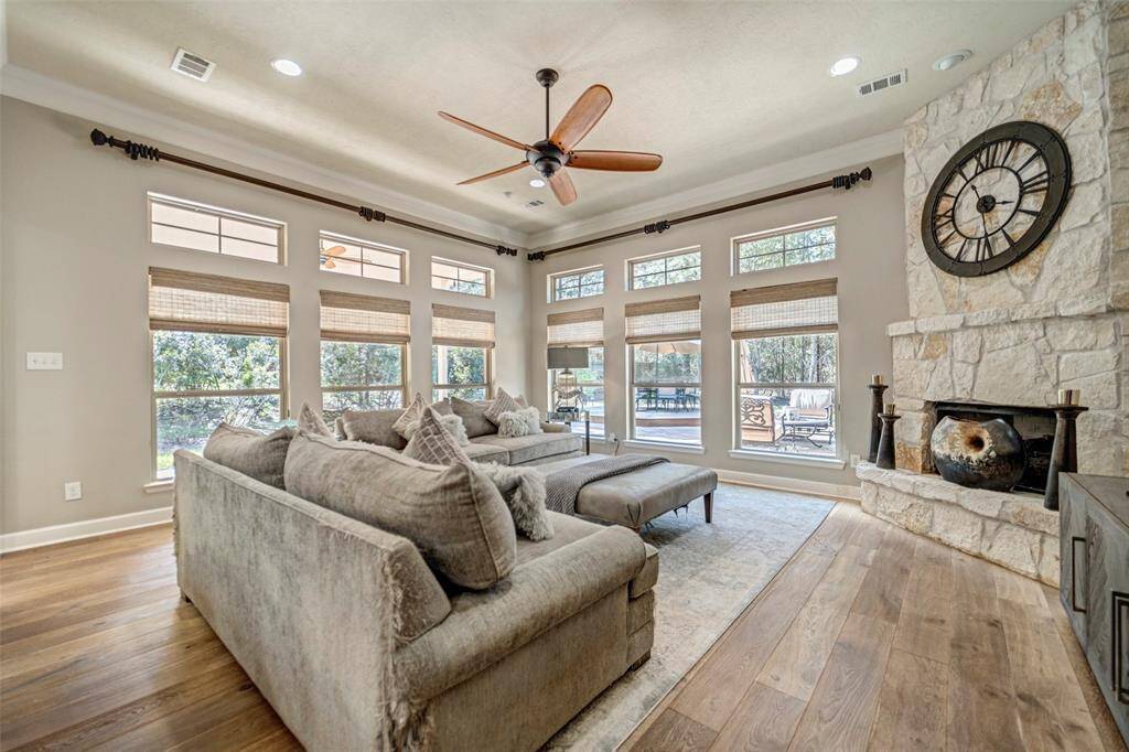 Family room is open to kitchen with natural lighting