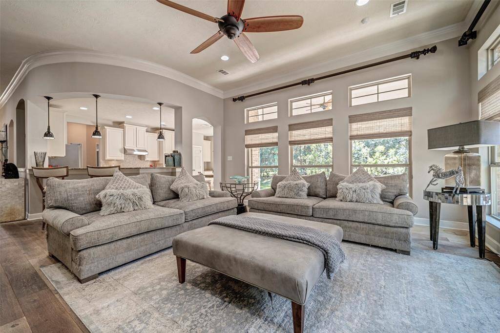 Family room is open to kitchen with natural lighting