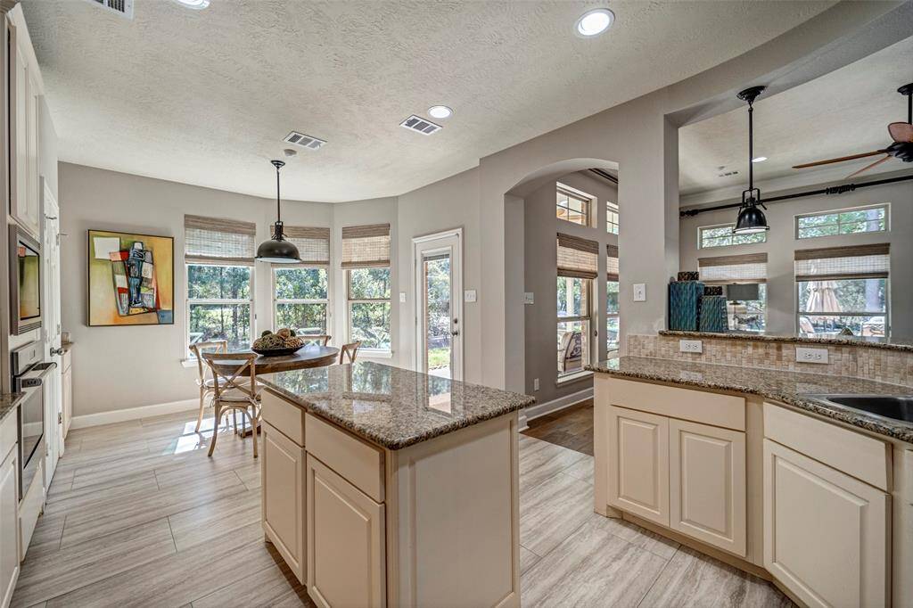 Kitchen opens to breakfast area