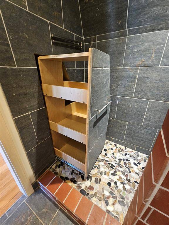 Oversized walk in shower in guest bath.