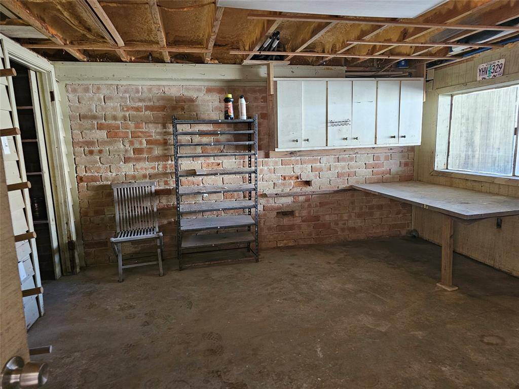 Enclosed storage area on ground level.