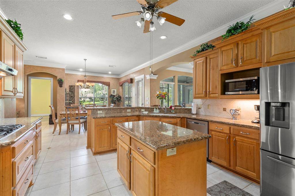 Open kitchen leading to extra-large breakfast room