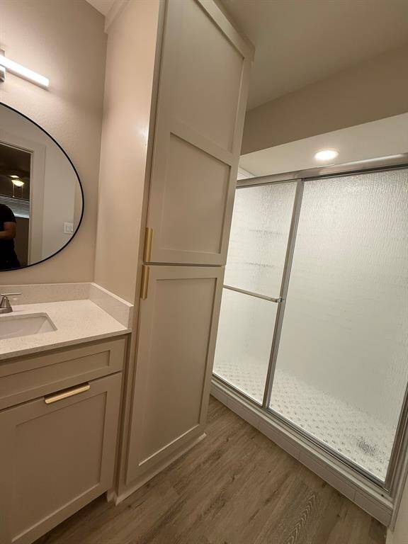 Bathroom is accessible from primary bedroom or separate water closet off hallway