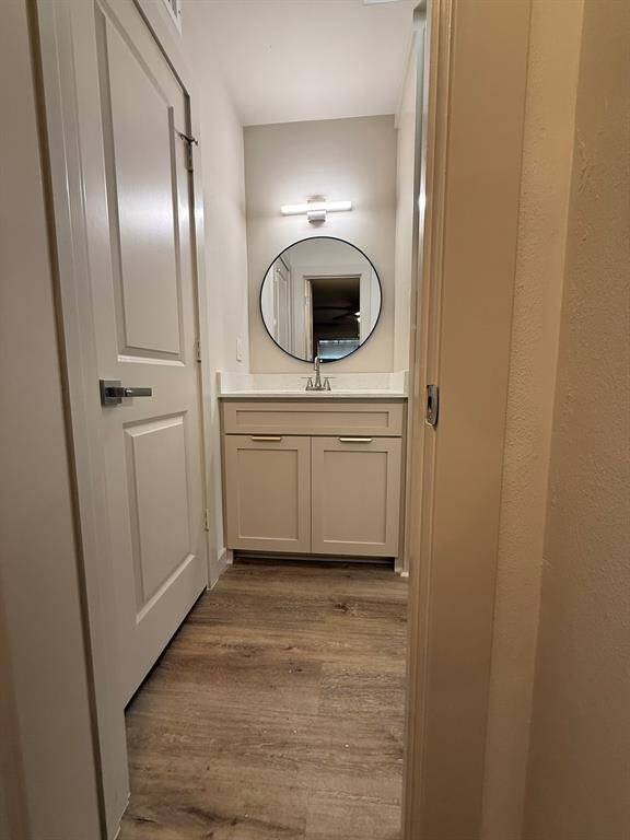 Bathroom with separate lavatory, shower accessible from primary bedroom or hallway water closet off