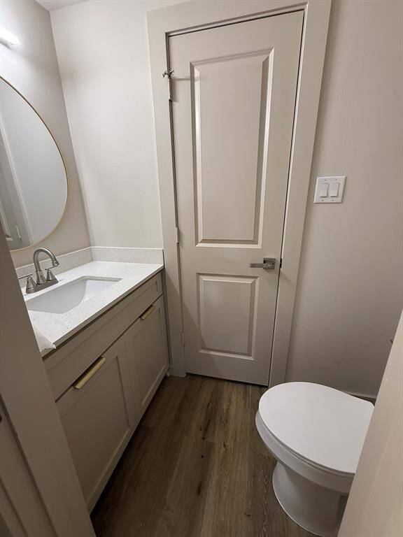 Private water closet off hallway also with a door to bathroom shower