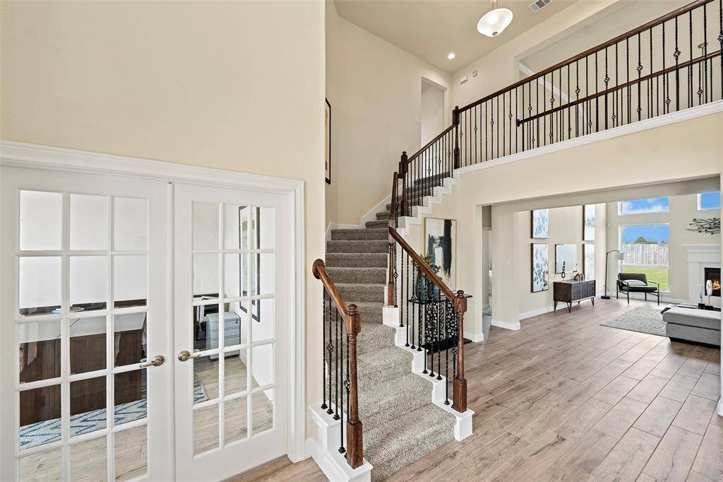 Upgraded Wrought Iron Stir Railing. Love the Cat Walk!