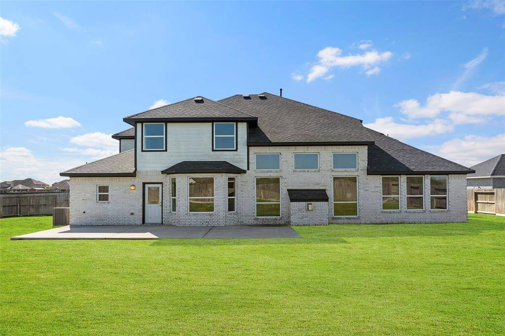 This a Texas size yard with an extra lot.