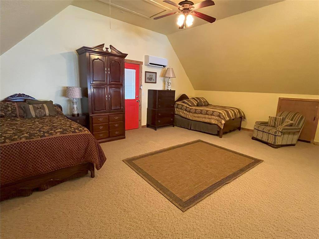 Loft Bedroom with Door to Outside Balcony