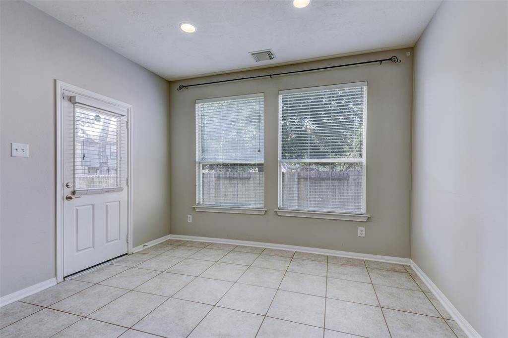 Dining area conveniently part of the kitchen with a great view of the backyard and opens to the back patio