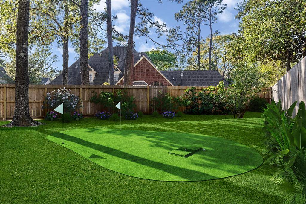THIS IS A RENDERING of what the backyard space would look like w/ putting green.