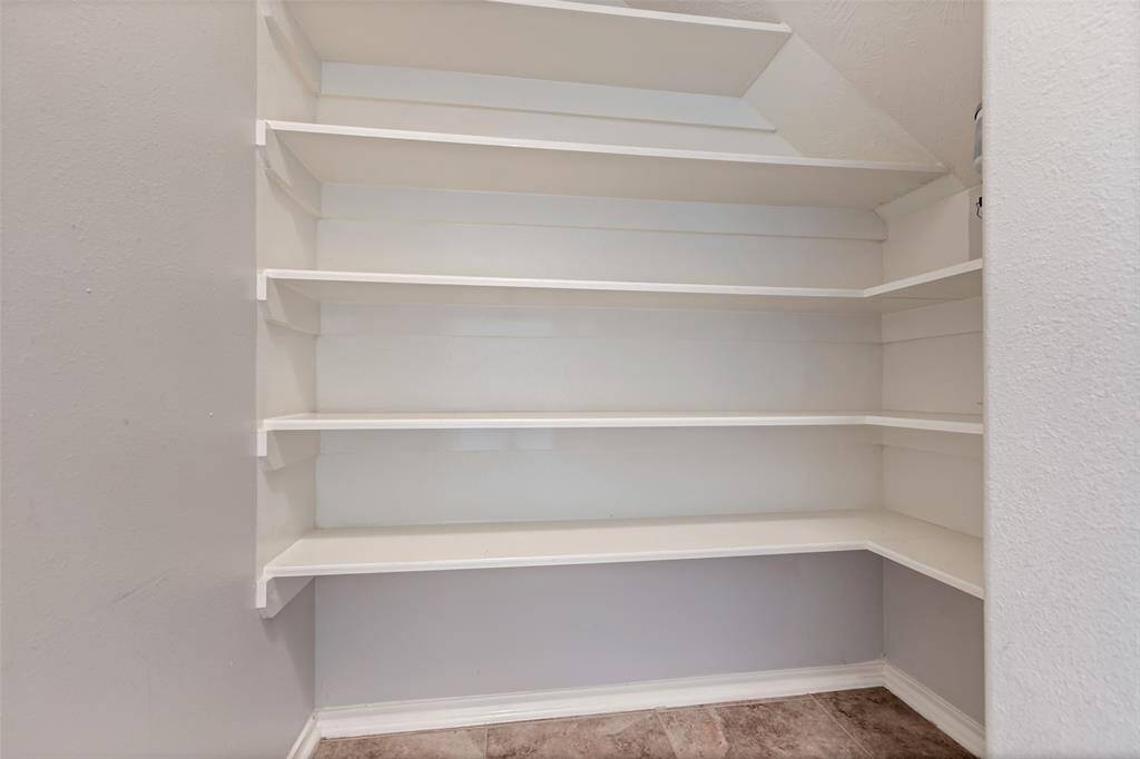 Spacious walk in pantry.