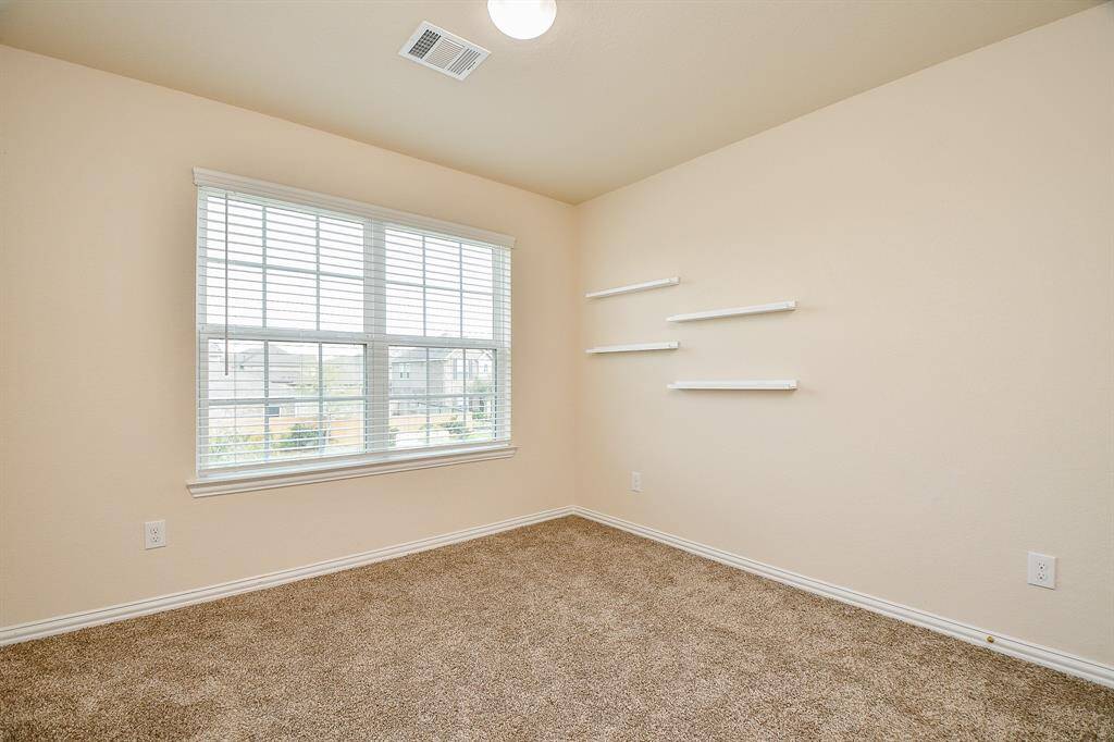 View of the secondary bedroom upstairs