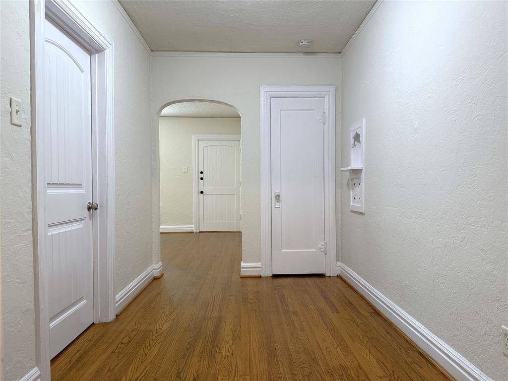The view from the kitchen into the dining room.