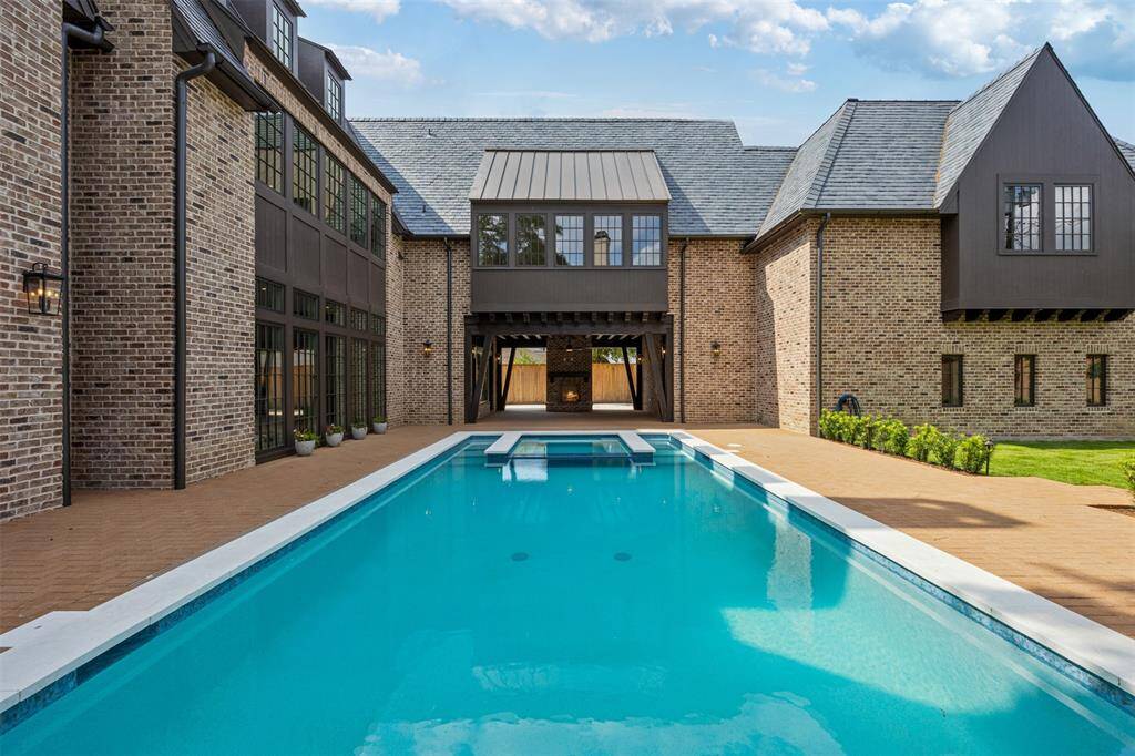 This upper-level retreat welcomes endless possibilities, from a private home office to a playroom, media space, or fitness area. Featuring dormer windows, wide-plank hardwoods, and recessed lighting, it offers a quiet, light-filled escape with plenty of room to make it your own.