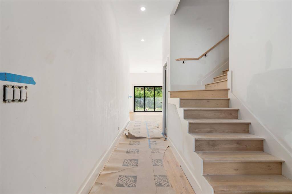 The stair wall will be glass.