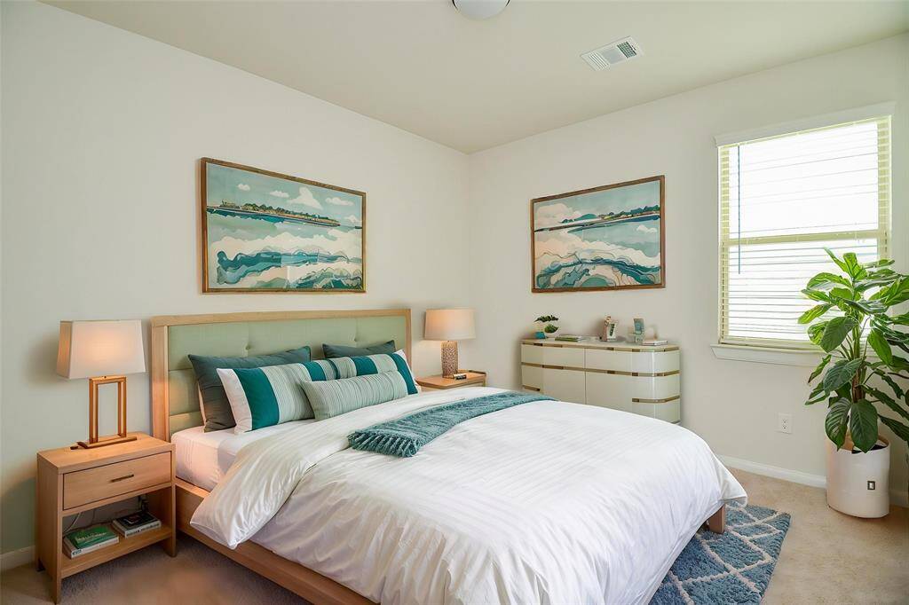 Discover a serene and inviting space in this secondary bedroom.