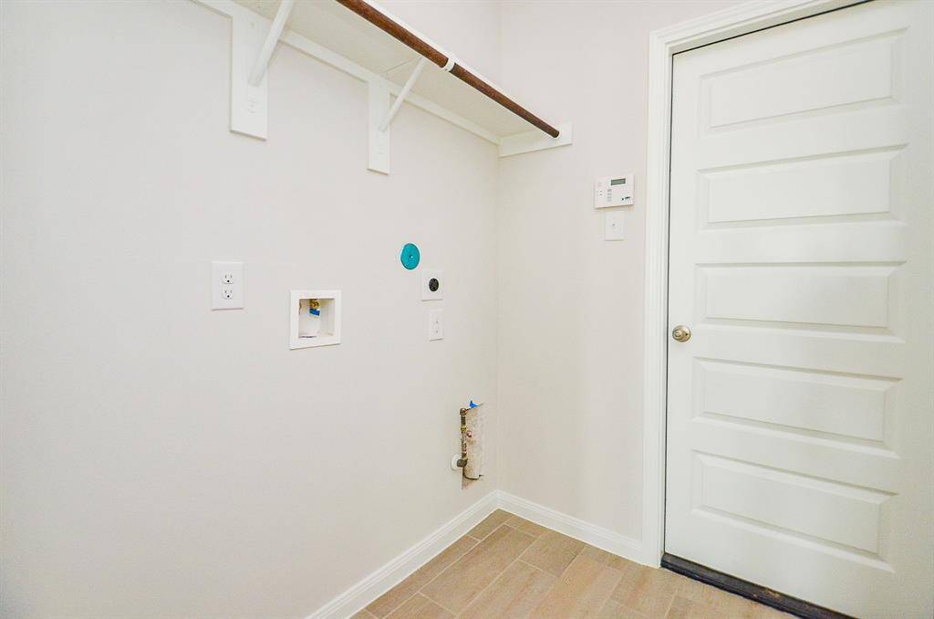 The stunning shower wall is easy to clean, and the shower/tub combination offers great accessibility.