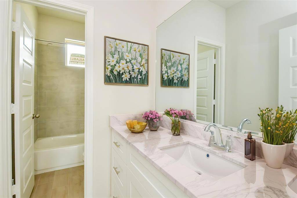 Step into this well-proportioned bedroom that offers ample space for various personal touches.