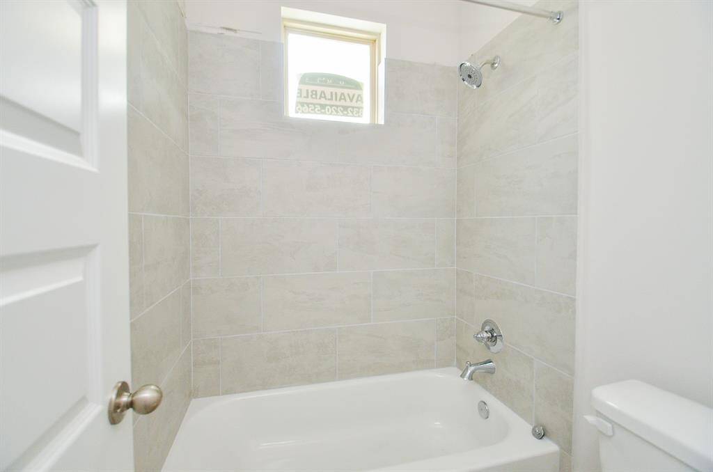This is an excellent utility room with ample storage space.