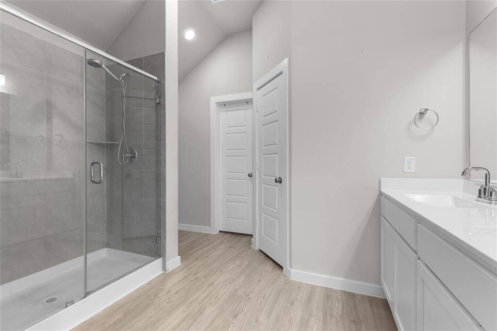 Over-sized shower, double vanity and additional nook just on the other side of shower...