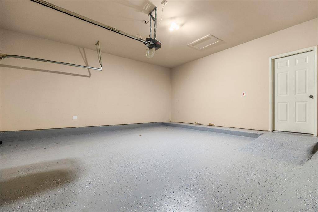 Spacious two car garage. The 4' extension will allows to store bikes and second fridge