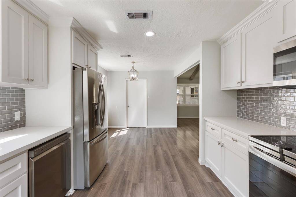 Kitchen featuring stainless steel appliances.