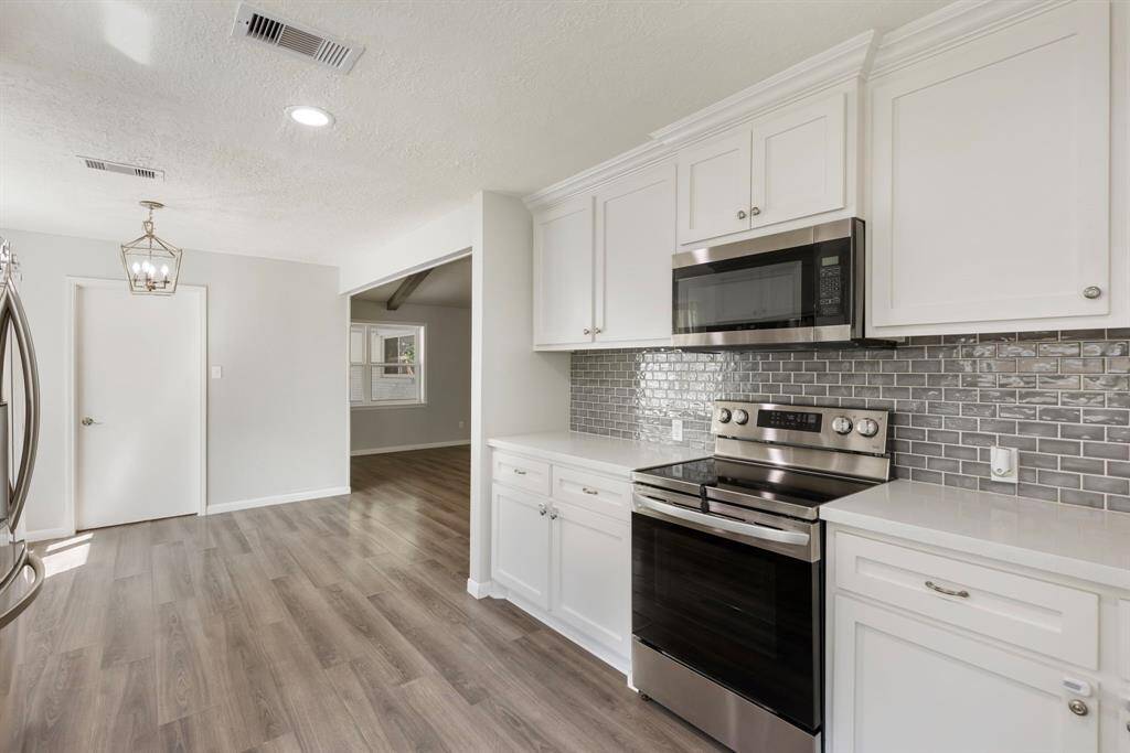 Kitchen featuring stainless steel appliances.