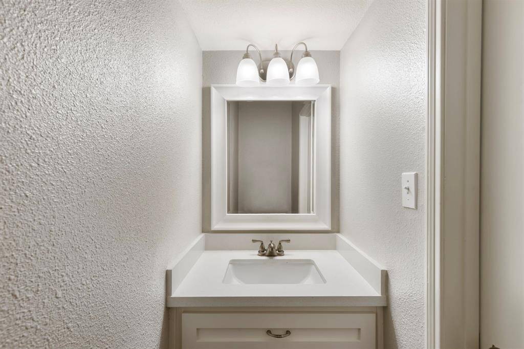 Half-bath off of the utility room.