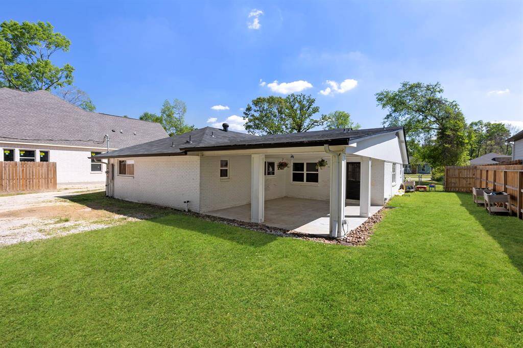 HUGE backyard with trees for privacy and a recent fence along the perimeter.