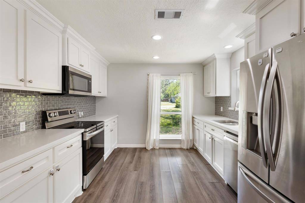 Kitchen featuring stainless steel appliances.