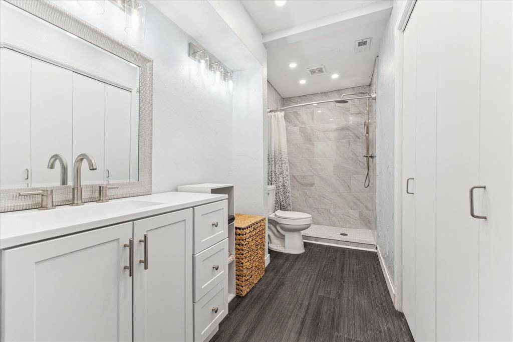 Beautifully updated primary bathroom with walk in shower