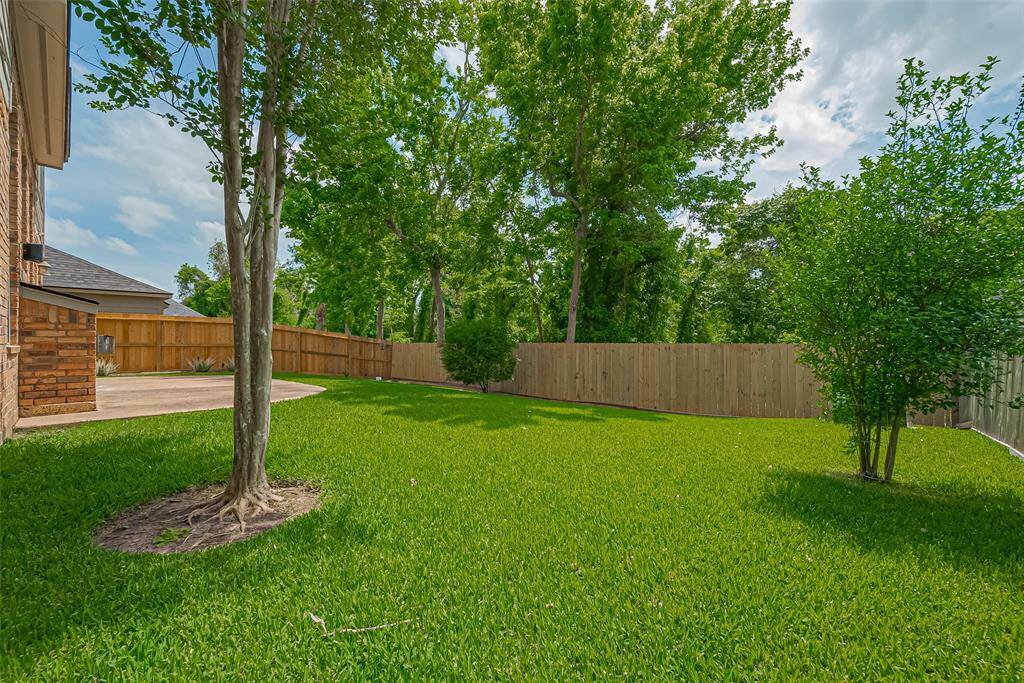 Just picture sitting in this private backyard and enjoying nature all around you.