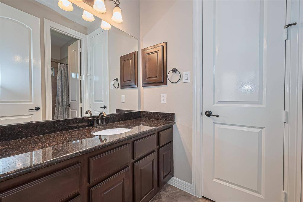 Secondary bathroom #2 located between two secondary bedrooms