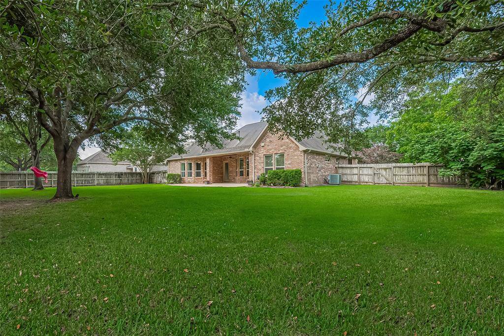 Situated on a large, peaceful lot, there’s plenty of room to spread out. Relax and unwind on the covered patio!