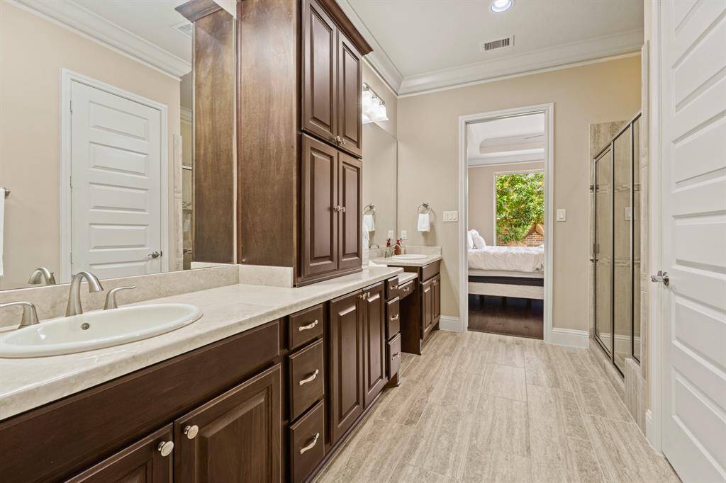 Primary bathroom from closet view