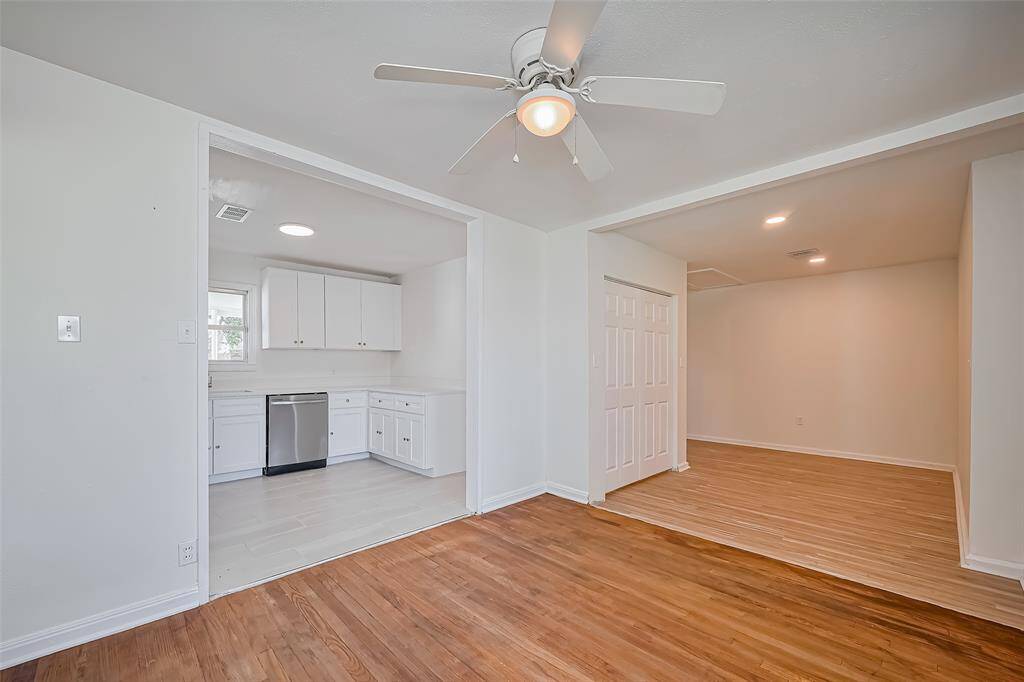 Utility room conveniently located in house.