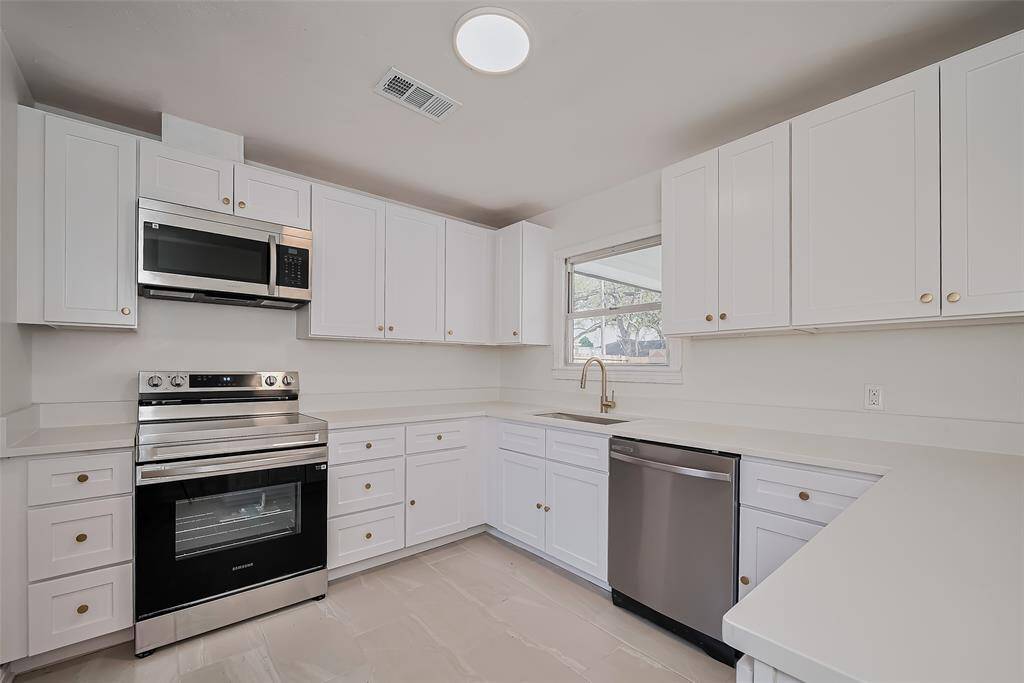 Upgraded stainless steel appliances with soft closing cabinetry.