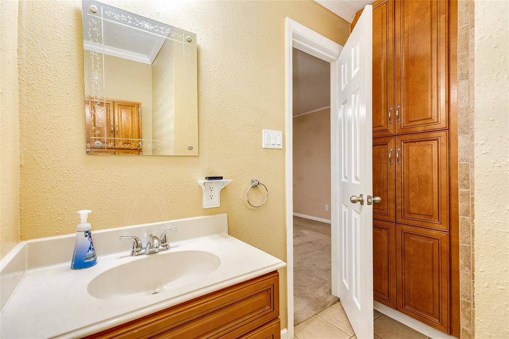 The Primary en-suite features plenty of storage.