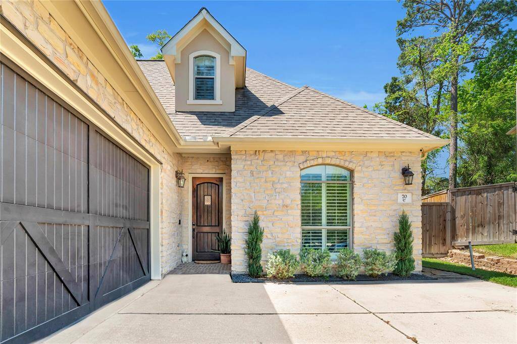 Beautiful wood door welcomes you home.