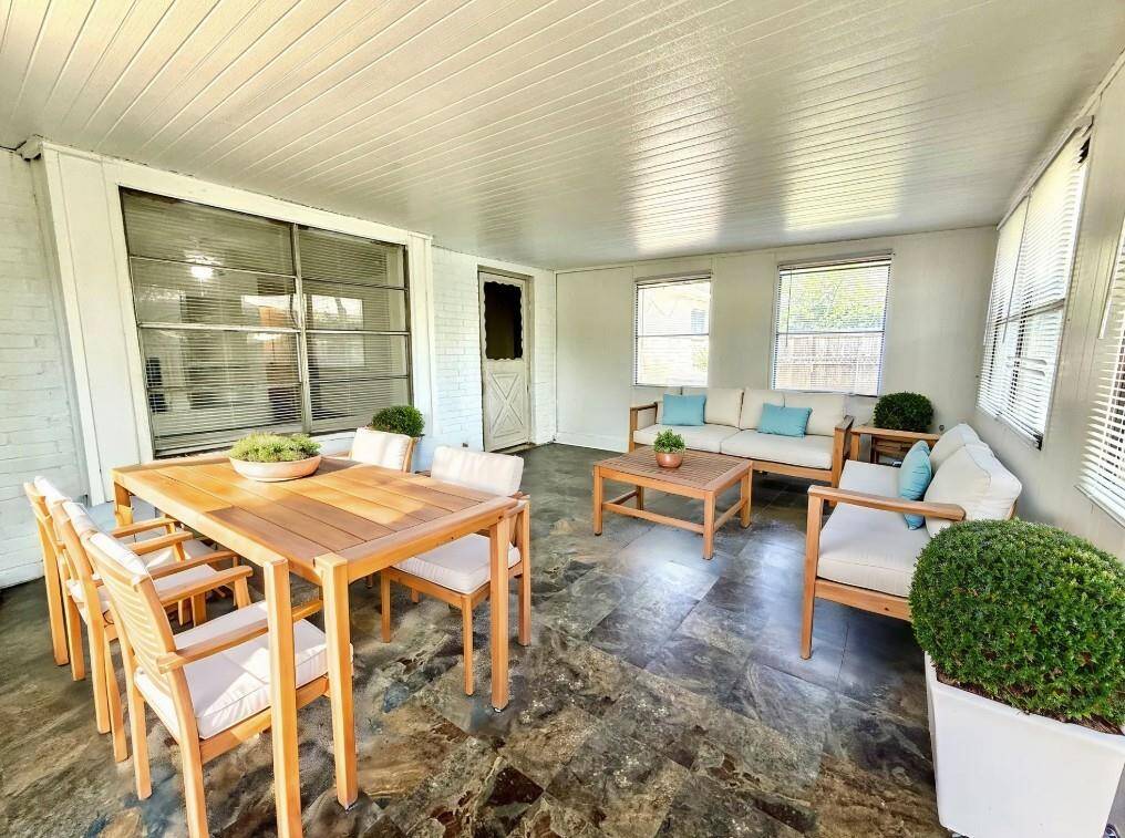 Spacious enclosed patio perfect for entertaining.