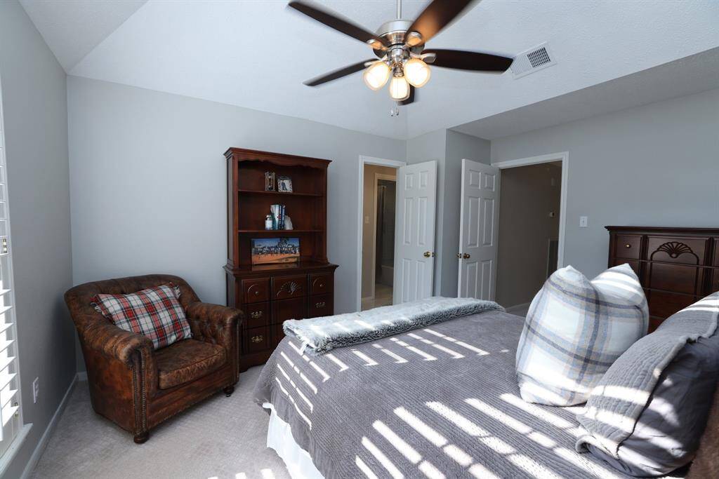 This bedroom is also in the front of the house and is at the top of the stairs.