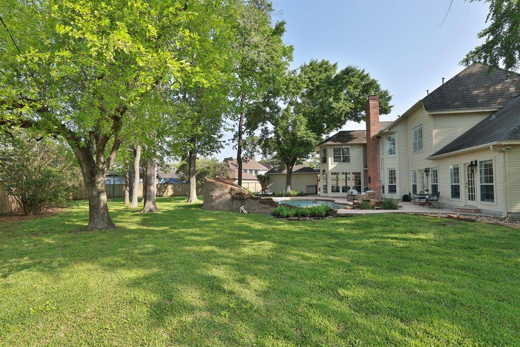 This back yard pool and spa is amazing. Notice the large patio space. The backyard is on the east side of the home.