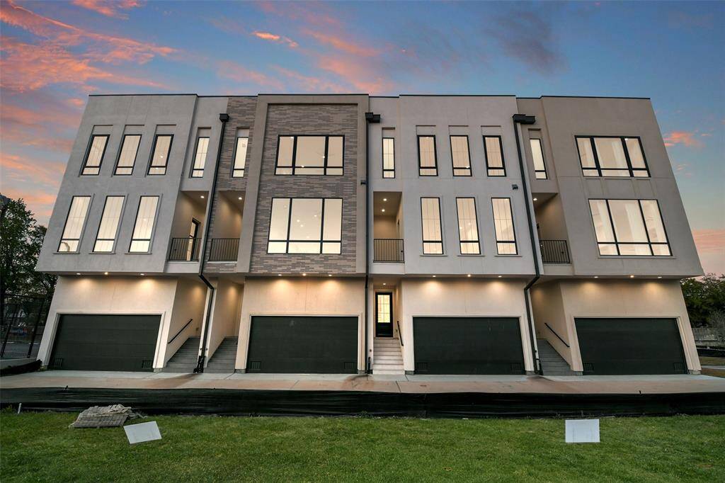 Front view of the four completed homes.  12836 Verdi is the second home from the  right.