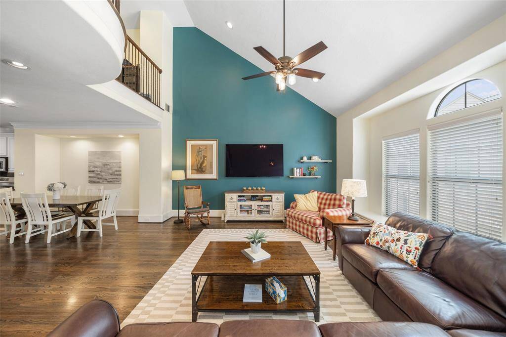 This photo showcases the open floor plan on the second floor, designed for easy flow and perfect for entertaining guests.