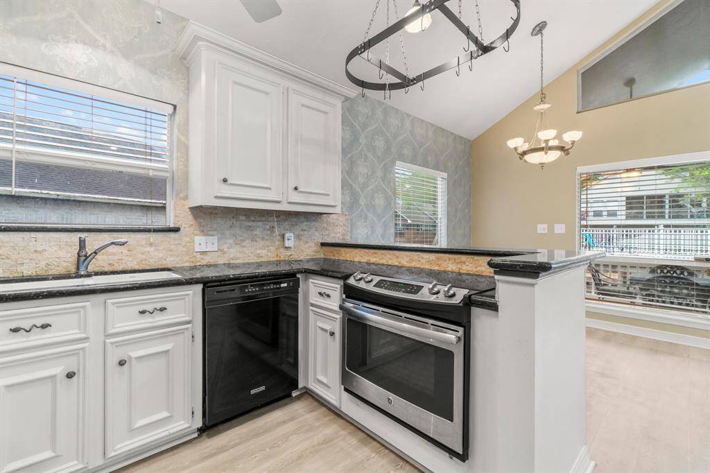 Another view of the kitchen.  Don't miss the window over the sink.