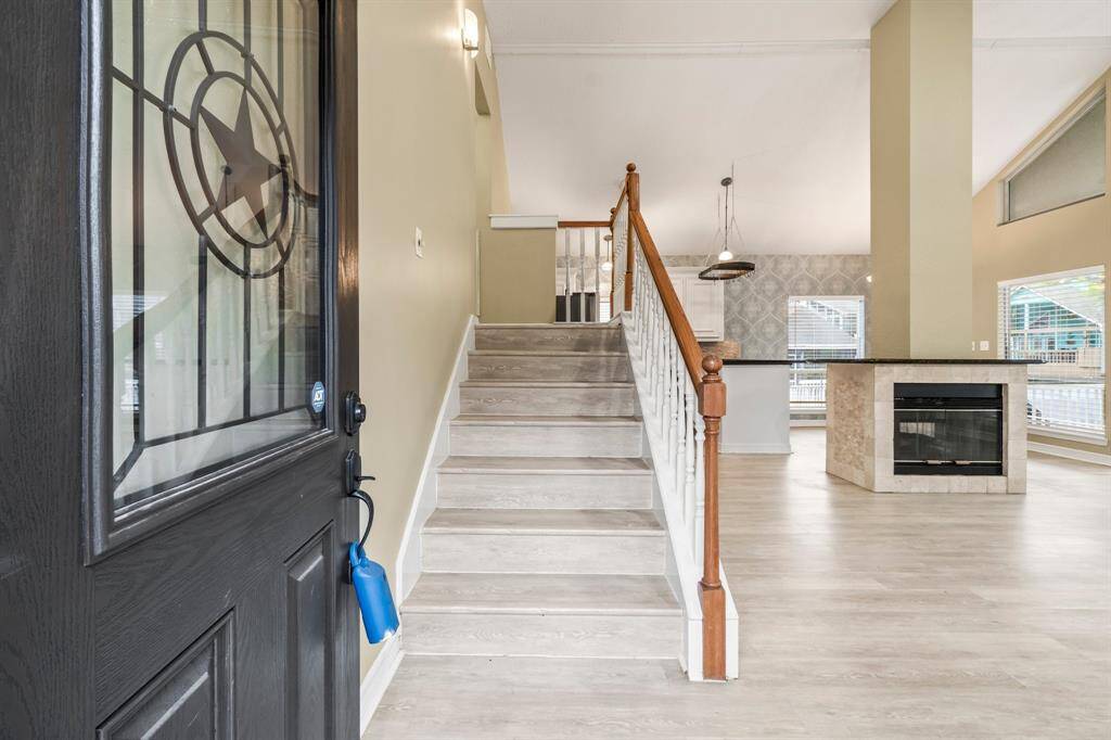 The first glimpse provides a view of this light and open space. Great for entertaining.